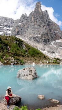 Serene Lake Sorapiss beneath Dito di Dio in the Dolomites