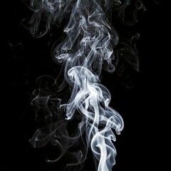 Wisps of white smoke curl and ascend against a stark black background, creating an ethereal and abstract visual.