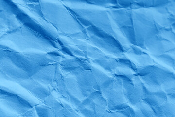 Blue paper texture background. Wrinkled paper surface abstract background.