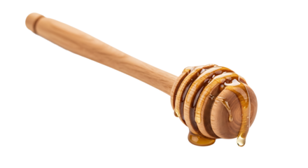 Golden honey drips off the wooden honey dipper, ready to sweeten anything or a delicious treat by itself.