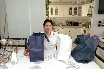 Adult man happy with his purchases