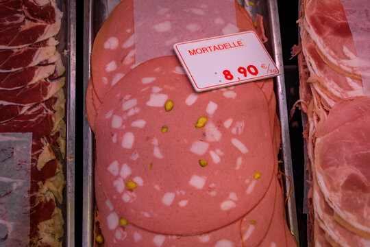 Sliced mortadella pistachios on at a butcher shop in the Old Town in Nice France