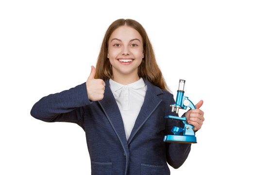 Back to school. Teen girl with microscope isolated white. Biology science for schoolgirl. Microscope research. Scientific education. School biology girl hold microscope. Student of biology. Thumb up