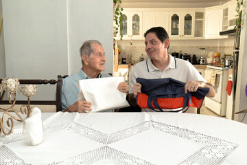 Father and son of Latin descent enjoying shopping together