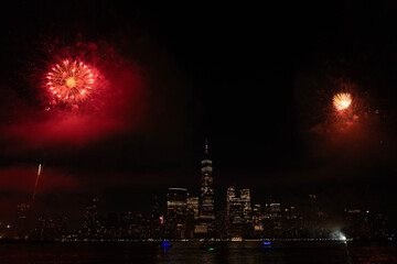 New York Manhattan fireworks. New York Fireworks over Manhattan. New York City 4th of July Fireworks. New York City Skyline Manhattan with Flashing Fireworks. Independence day.