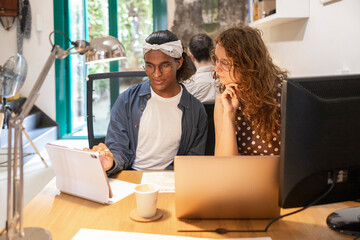 Collaborative workspace with diverse team brainstorming