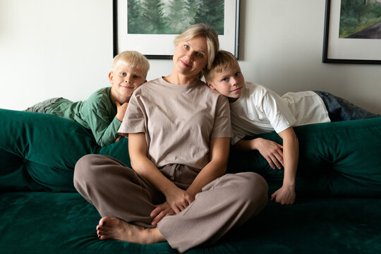Family enjoying quality time at home on the couch