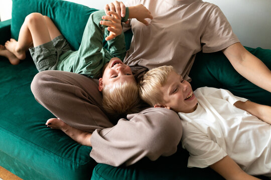 Family enjoying quality time on the couch