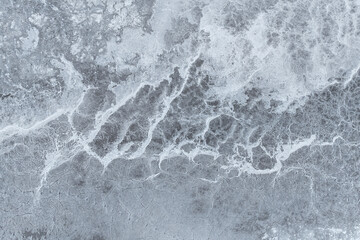 Abstract saline mud texture in cracked gray pattern