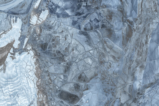 Abstract aerial view of cracked salt and mud textures