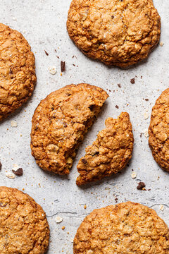 Homemade chocolate chip cookies on rustic surface