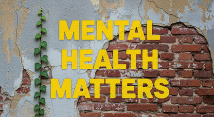 Mental health matters message on urban wall with cracked brick and green vine. Mental health matters visual highlights importance of well-being and resilience.