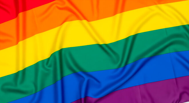 Rainbow flag waving, representing the LGBTQ+ community and pride