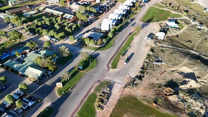 Fototapeta premium Panoramic aerial view of Coral Bay Western Australia with coral reef and tropical seascape