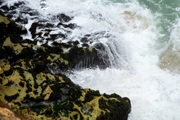 wave breaking on the beach in Nazar&eacute;, Portugal