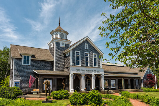 Dennis, MA - June 5, 2025: The Cape Cod Museum of Art, featuring art from Cape Cod artists, has seven galleries, a museum shop, and is surrounded by a sculpture garden.