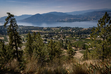 Scenic view of Lake Okanagan with mountains in the distance.