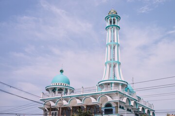 The beautiful architecture of a mosque in indonesia on a sunny day