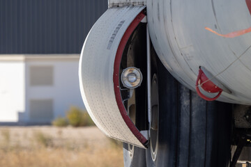Close-up of propeller spinner and blade root assembly showing aged paint and wear on old static aircraft