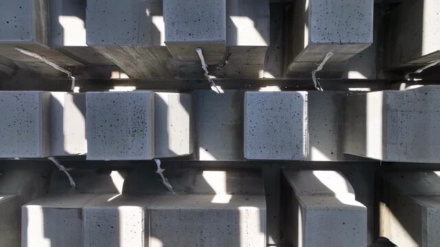 architectural vision: minimalist concrete cubes with dynamic light and shadow interplay creating an abstract geometric aesthetic perception