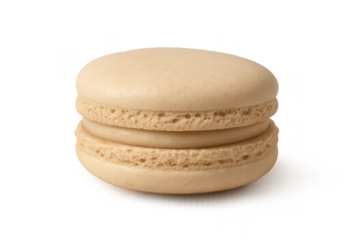 Delicate beige macaron cookie on transparent background