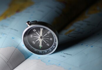 The compass on the map travel adventure photo 