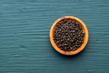 Aromatic black pepper in a bowl - Piper nigrum