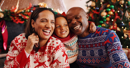 Laughing, family and selfie for Christmas, home and bonding on December holiday, happy and together. Interracial, man and woman with child on Xmas, celebration and photography for festive season