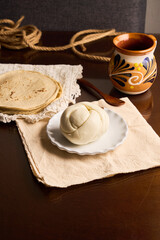 Traditional delicious Oaxaca cheese or Quesillo. Mexican food