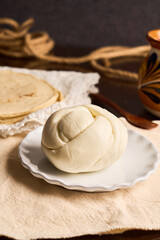 Traditional oaxaca cheese ball or quesillo. Mexican food.