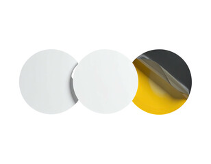 Three layered circles, one peeled, shows yellow underlay