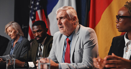 Politics, group and man with speech at press conference for economic relations, delegation or...