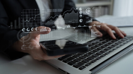 A business professional engages in financial analysis using a smartphone and laptop, featuring graphs and charts overlay to emphasize data insights in a modern office environment. Scalp