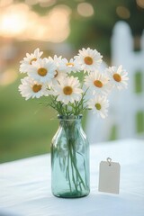 Fresh white daisies in a green glass bottle vase with soft sunlight and blurred natural background creating a calm and serene atmosphere
