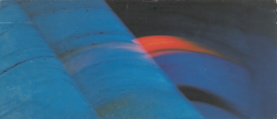 Abstract light patterns in blue tones with a hint of red glow.