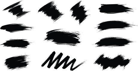 Collection of black grunge paint brush strokes and splatters on white background