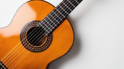 Fototapeta premium Acoustic guitar resting on a white surface studio shot musical instrument