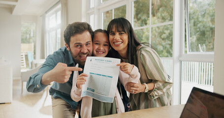 Portrait, school report and parents with child in home for score, good grades and exam results. Pointing, proud family and happy mom, dad and girl with card for education, learning success or support