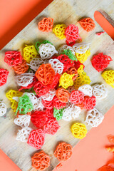 Crackers, cuanki, noodles, and complete dry seblak seasoning on a wooden tray
