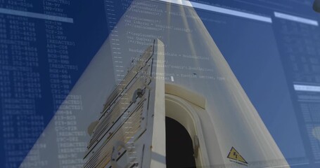 Technician pulling hatch handles at wind turbine, lowering panel for safety check with code overlay - Powered by Adobe