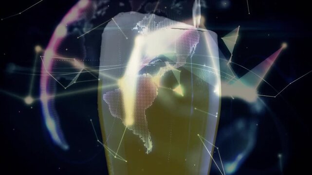 Pouring liquid filling pilsner glass, foam forming, globe emerging, orbiting nodes showing network