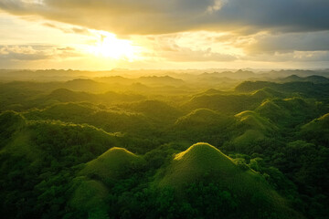 breathtaking sunset casting golden light over endless rolling green hills