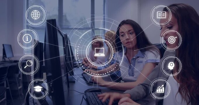 Right-hand woman pointing, middle woman typing, HUD overlay animating laptop icon in training lab