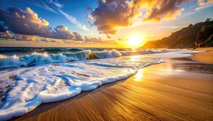 Golden sunset casting warm light over a sandy beach with gentle waves lapping the shore under a dramatic cloudy sky with vibrant orange and yellow hues