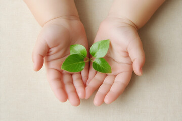 child hands protecting tiny seedling, representing greener future
