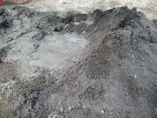 mix sand with cement and enough water to build a house