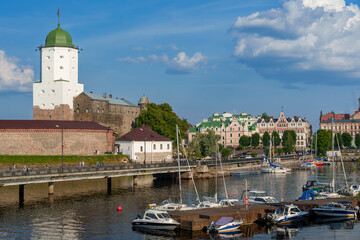 Fototapeta premium Vyborg Castle with green dome tower on a sunny day in Russia