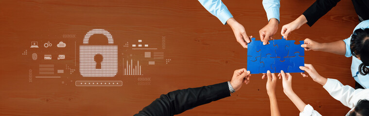 A diverse team collaborates to complete a puzzle while a digital lock symbol and data graphics highlight the importance of cybersecurity in teamwork. Trope