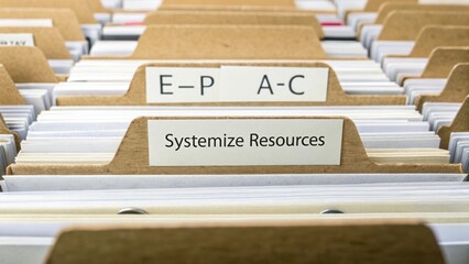 Organized file cabinet with labeled folders showcasing systematic resource management and efficient document control practices