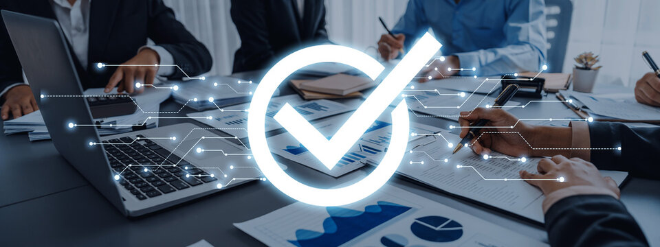 Engaging business meeting scene showcasing teamwork and digital connectivity with checkmarks, documents, and technology in a modern office environment. Trope
